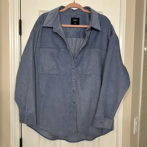 Denim colored corduroy button up. Can be worn as a top or jacket!